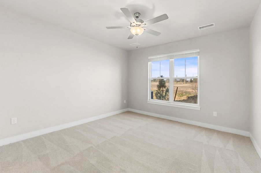 Spacious, unfurnished interior of a new home in Highlands at Fox Hill, Longmont (Image 11).