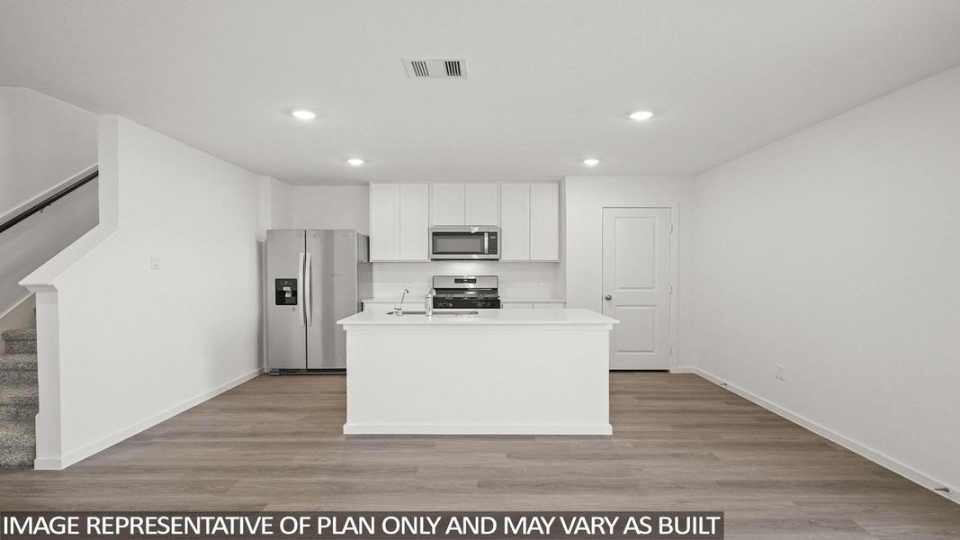 Furnished interior view inside a new home in Sunterra, Katy (Image 5).