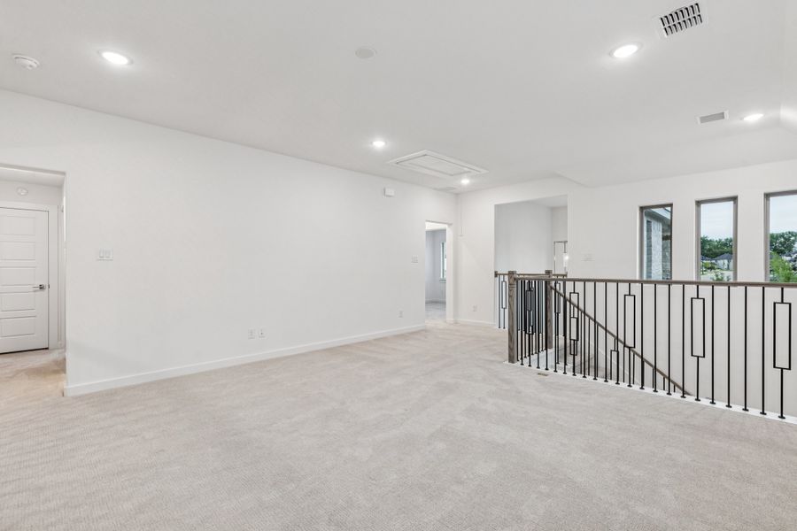 Game Room in the Picasso II home plan by Trophy Signature Homes – REPRESENTATIVE PHOTO