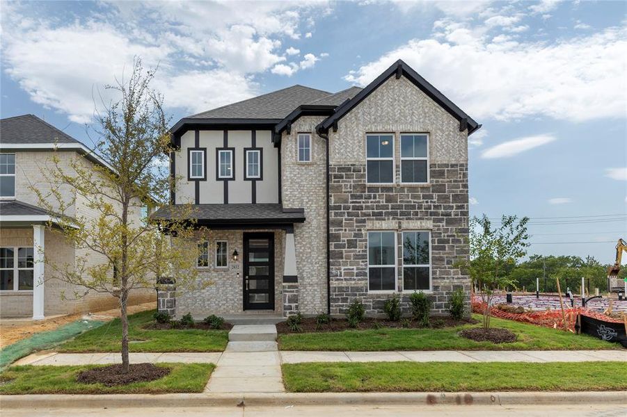 Front exterior of a new home in La Terra at Uptown Celina, Celina, TX, highlighting curb appeal (Image 1).