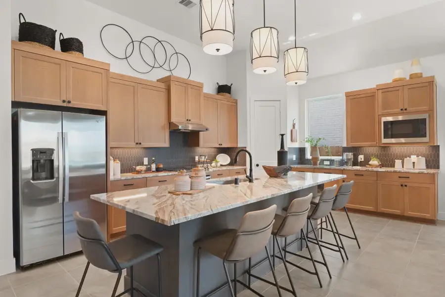 Representative furnished interior of a home built from the Rivers by Chesmar Homes in Prominence 50's, San Antonio (Image 4).