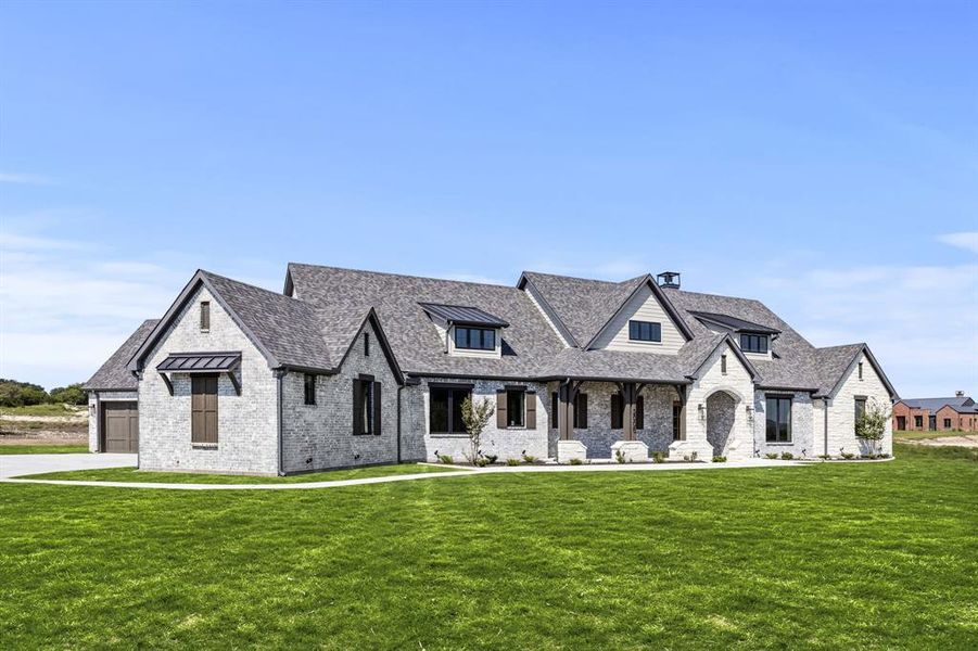Front exterior of a new home in , Aledo, TX, highlighting curb appeal (Image 21).