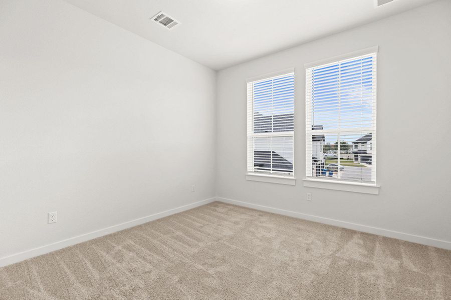 An airy bedroom with fresh carpet and ample natural light awaits your personal touch. An airy bedroom with fresh carpet and ample natural light awaits your personal touch.