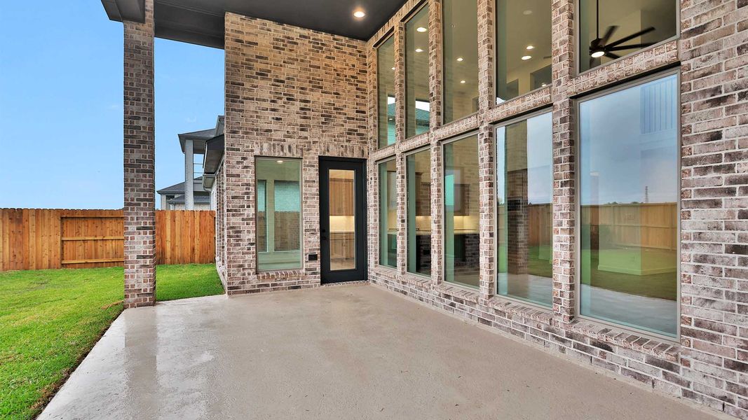 Exterior details and patio area of a home in Legacy Prairie at Katy Court, Katy (Image 3).