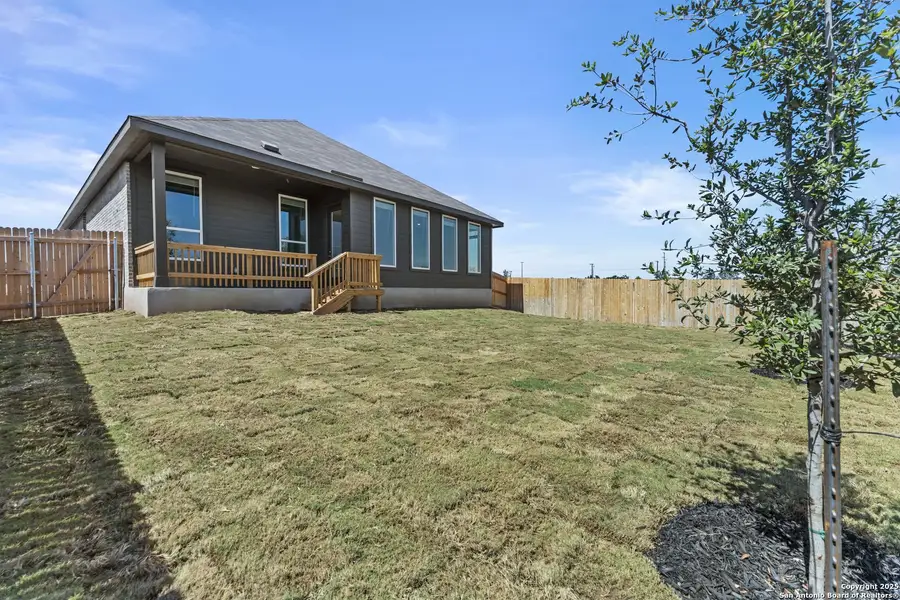 Front exterior of a new home in , New Braunfels, TX, highlighting curb appeal (Image 1). Front exterior of a new home in , New Braunfels, TX, highlighting curb appeal (Image 1).