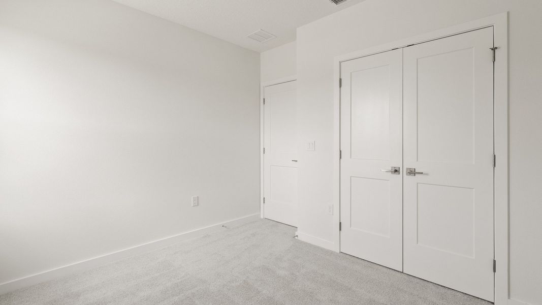 Representative furnished interior of a home built from the Flagler by DRB Homes in Grasslands West, Lakeland (Image 11).
