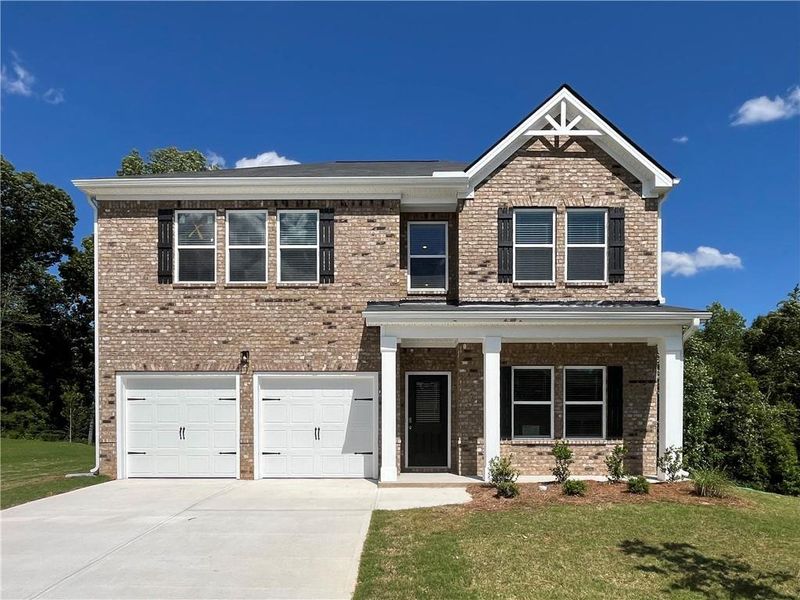 Front exterior of a new home in River Walk Farm, Covington, GA, highlighting curb appeal (Image 1). Front exterior of a new home in River Walk Farm, Covington, GA, highlighting curb appeal (Image 1).