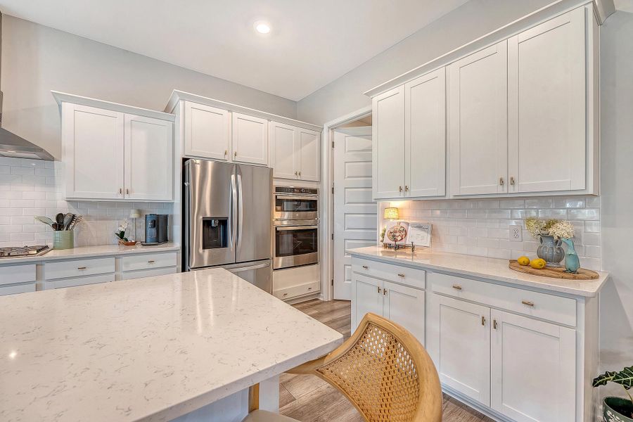 Furnished interior view inside a new home in Horizons at Summers Corner | 55+: The Estates, Summerville (Image 39).