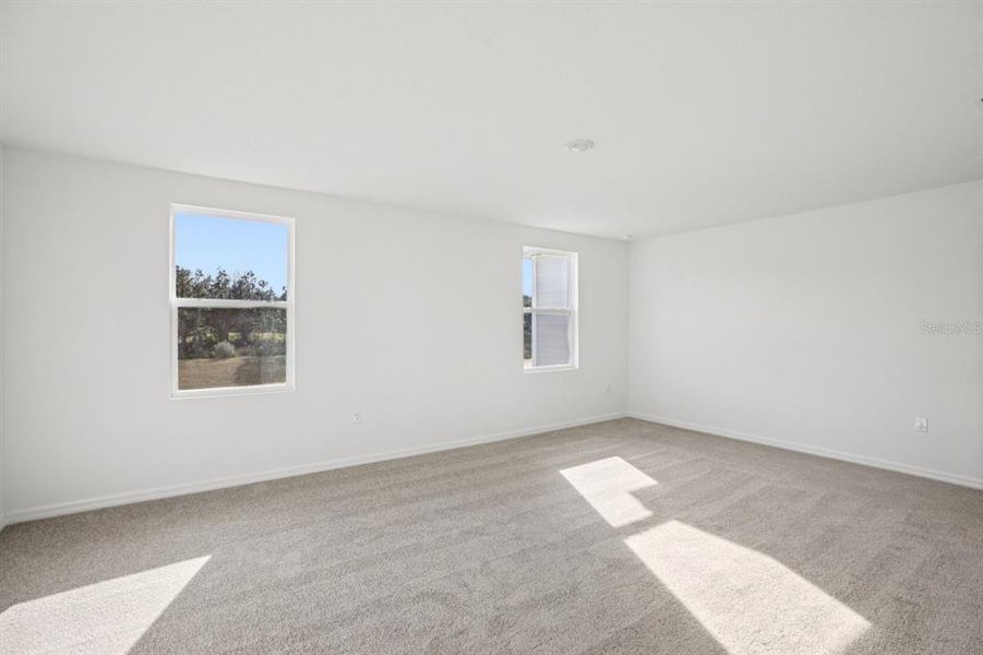 Spacious, unfurnished interior of a new home in Northlake at Ovation, Winter Garden (Image 30).