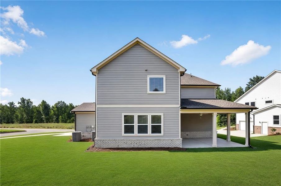 Exterior details and patio area of a home in Estates at Yellow Creek, Cumming (Image 4).