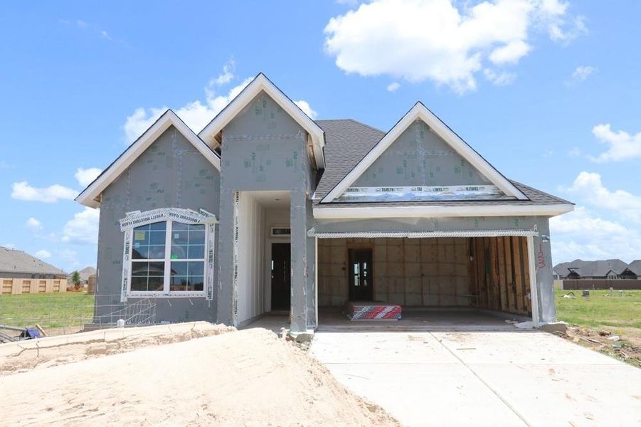 Front exterior of a new home in Brookewater 45' Homesites, Rosenberg, TX, highlighting curb appeal (Image 2).