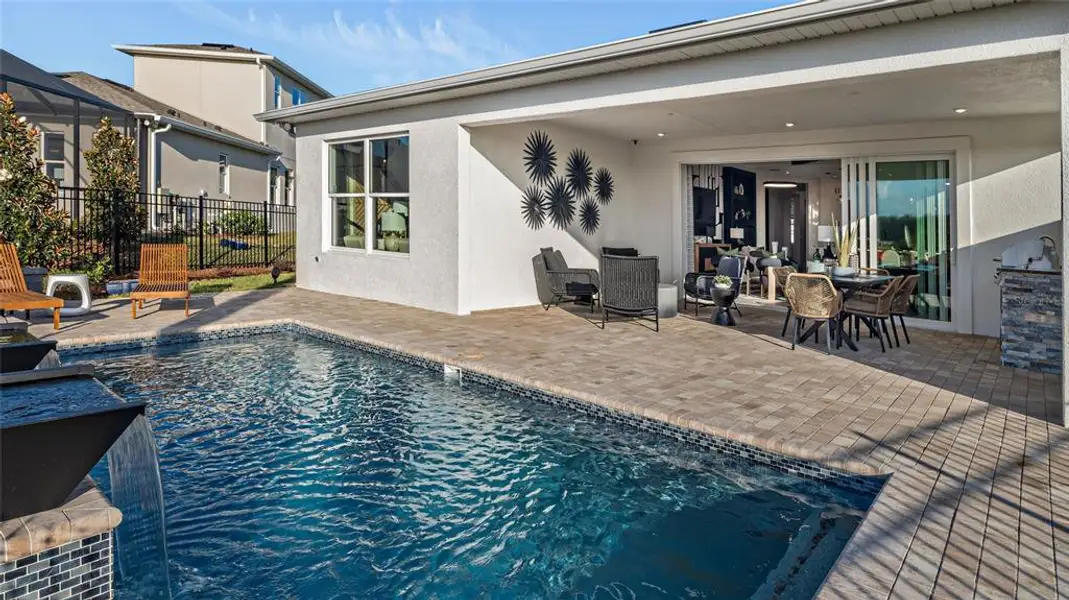Exterior details and patio area of a home in Cresswind at Lake Harris, Tavares (Image 3).