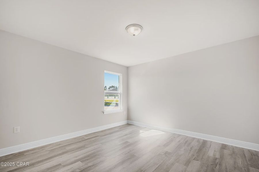 Representative unfurnished interior of a home built from the Plan 2101 by Adams Homes in The Bluffs at Lafayette, Freeport (Image 19).