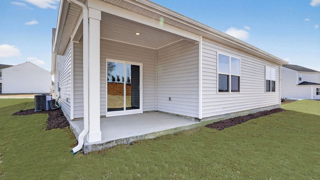 Exterior details and patio area of a home in Bexford, Willow Spring (Image 3).