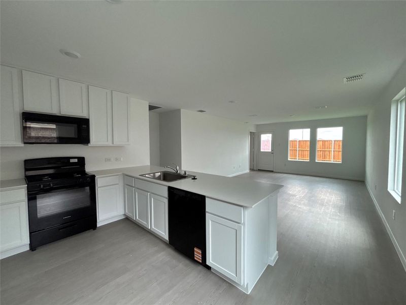 Furnished interior view inside a new home in Avalon Ridge: Cottage, Conroe (Image 5).