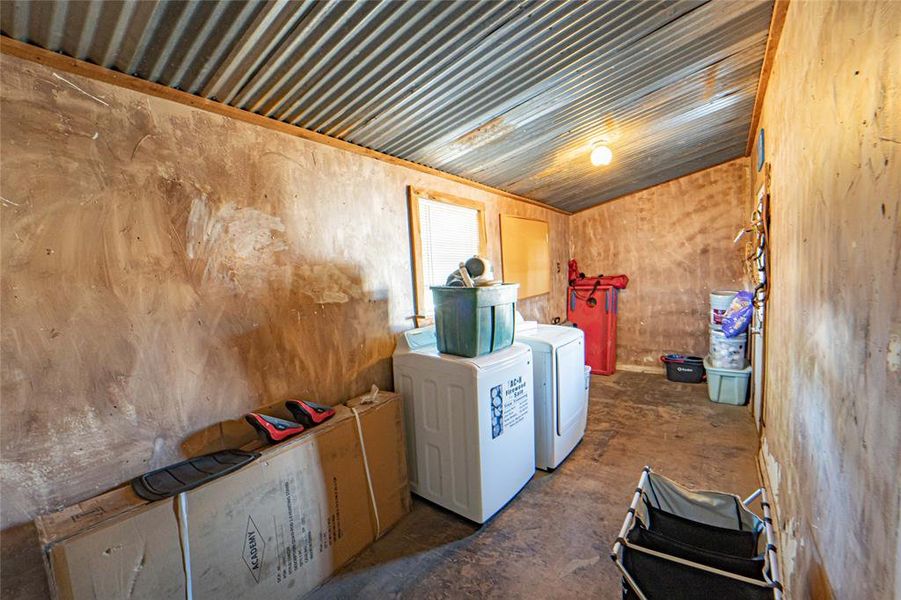 Laundry area with exterior exit door