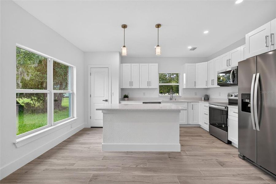 Furnished interior view inside a new home in , Port Charlotte (Image 10).