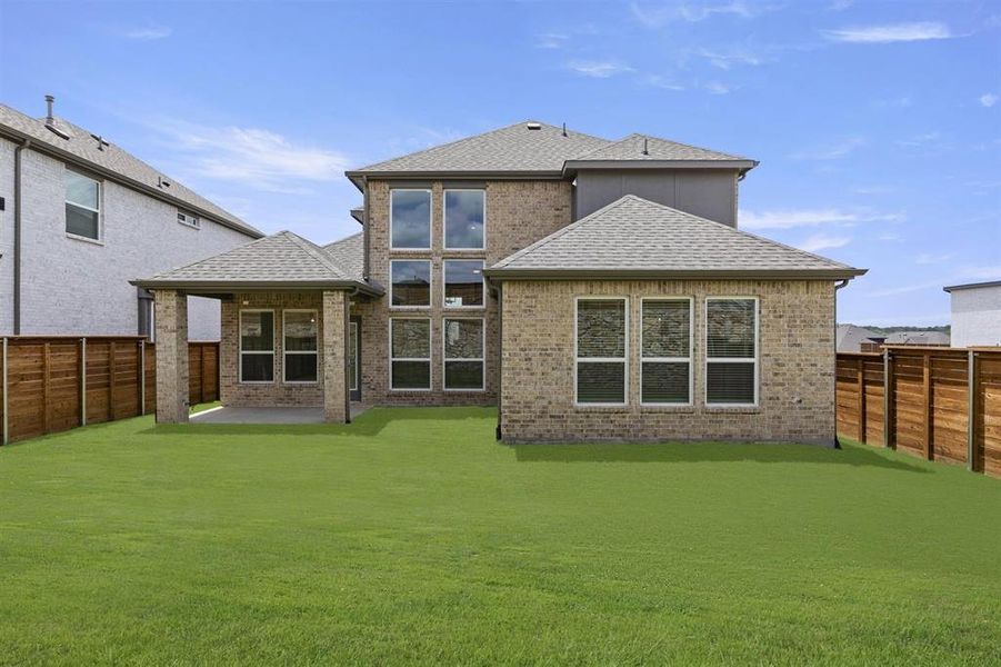 Exterior details and patio area of a home in Solterra, Mesquite (Image 22).