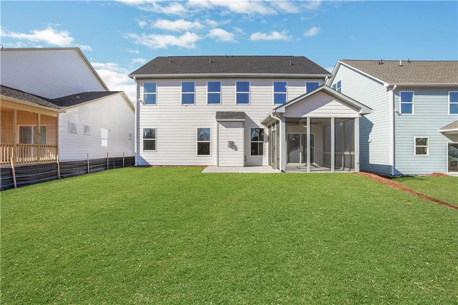 Exterior details and patio area of a home in Twin Lakes, Hoschton (Image 28).