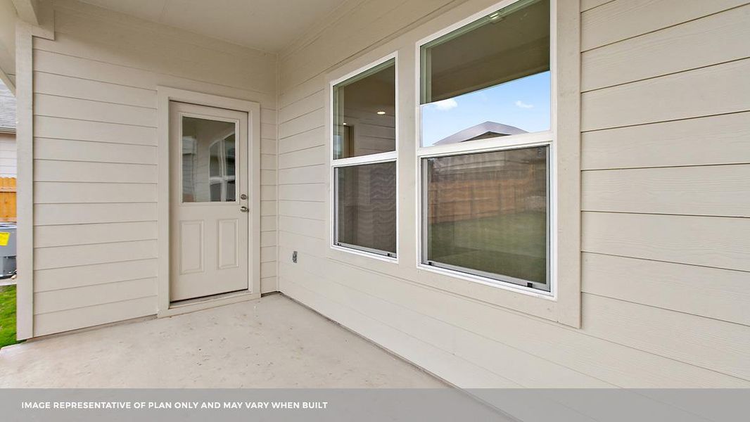 Exterior details and patio area of a home in Carillon, Manor (Image 4).