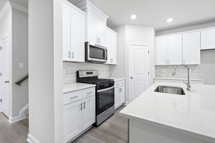 Furnished interior view inside a new home in Waterside - Coastline Series, Longs (Image 4). Furnished interior view inside a new home in Waterside - Coastline Series, Longs (Image 4).