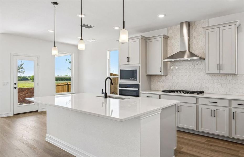Kitchen with pendent lighting
