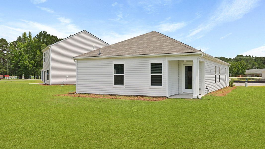 Front exterior of a new home in Evergreen, Holly Hill, SC, highlighting curb appeal (Image 23).