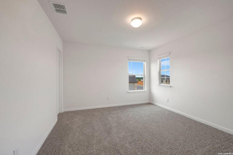 Spacious, unfurnished interior of a new home in Hickory Ridge Estates, Elmendorf (Image 43).