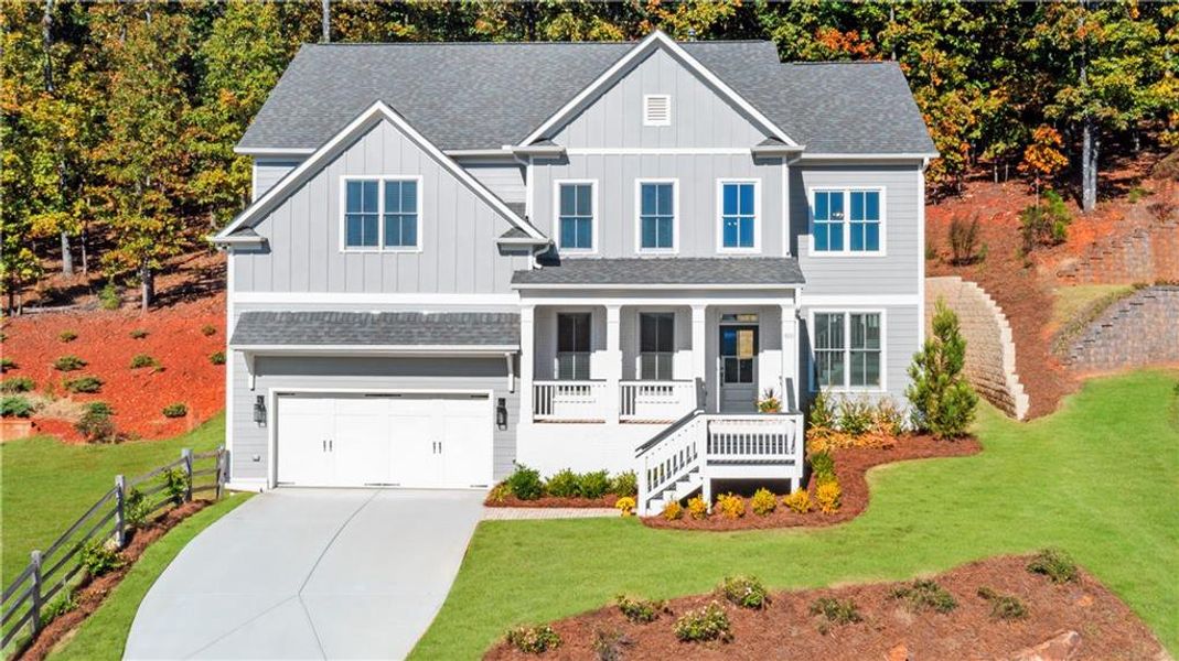 Front exterior of a new home in , Powder Springs, GA, highlighting curb appeal (Image 1).