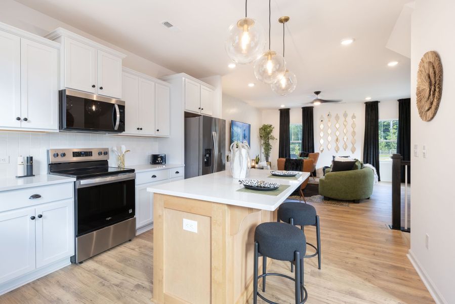 Representative furnished interior of a home built from the Myka TH by True Homes in Village at Reedy Creek Townhomes, Charlotte (Image 3).