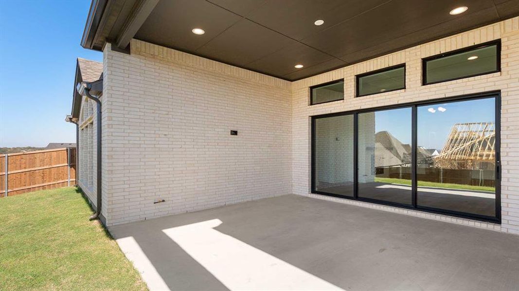Exterior details and patio area of a home in Talon Hills 60'/70', Fort Worth (Image 4).