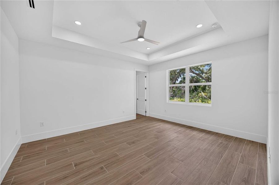 Spacious, unfurnished interior of a new home in , Port Charlotte (Image 43).