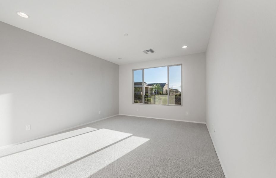 Spacious, unfurnished interior of a new home in Sun City Festival, Buckeye (Image 27).
