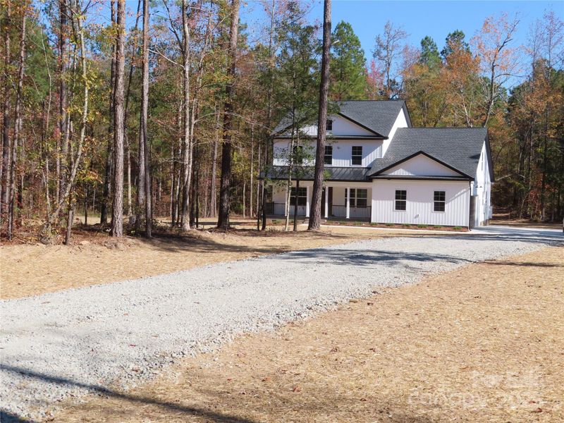 Front exterior of a new home in , Rock Hill, SC, highlighting curb appeal (Image 17).