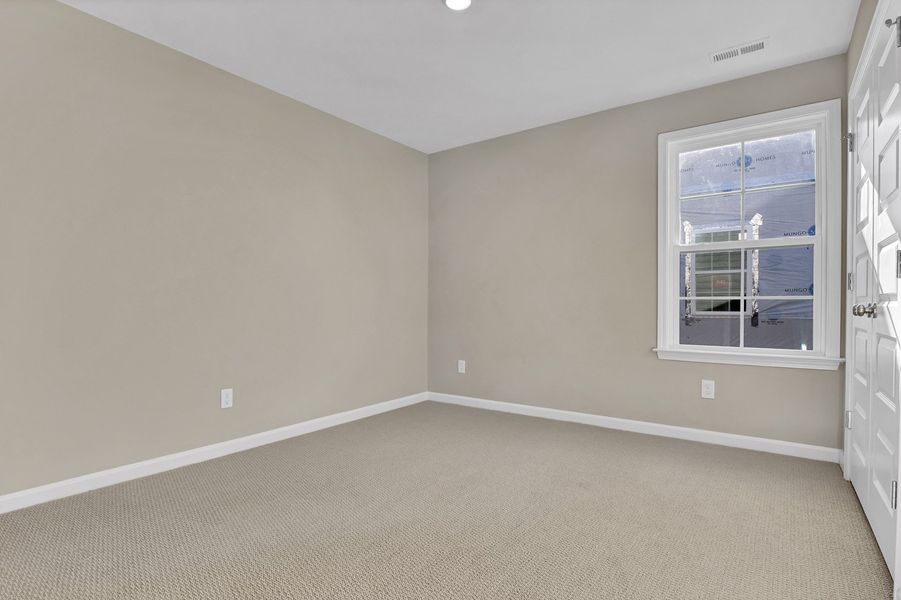 Spacious, unfurnished interior of a new home in Grand Park, Leland (Image 32).
