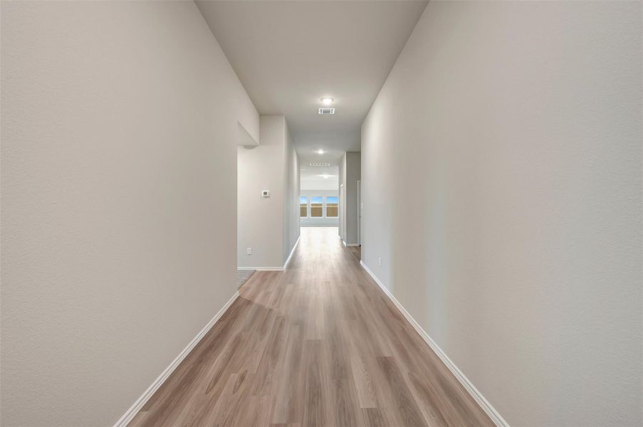 Spacious, unfurnished interior of a new home in Carillon, Manor (Image 19).