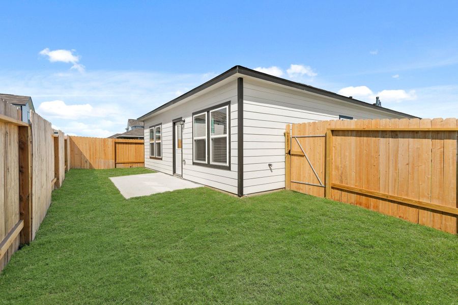 Exterior details and patio area of a home in Northpark South, Porter (Image 2). Exterior details and patio area of a home in Northpark South, Porter (Image 2).