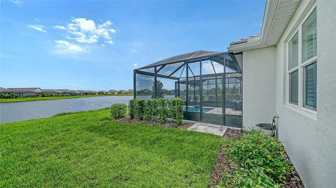 Exterior details and patio area of a home in LakeHouse Cove at Waterside, Sarasota (Image 27). Exterior details and patio area of a home in LakeHouse Cove at Waterside, Sarasota (Image 27).