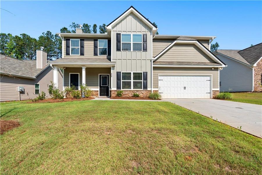 Front exterior of a new home in , Villa Rica, GA, highlighting curb appeal (Image 2). Front exterior of a new home in , Villa Rica, GA, highlighting curb appeal (Image 2).