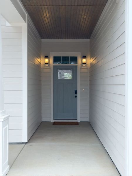 Representative exterior details of a home built from the Kauai by Bill Clark Homes in The Sanctuary at Sunset Beach, Sunset Beach (Image 4).