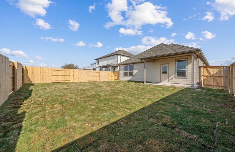 Exterior details and patio area of a home in Patterson Ranch, Georgetown (Image 26). Exterior details and patio area of a home in Patterson Ranch, Georgetown (Image 26).