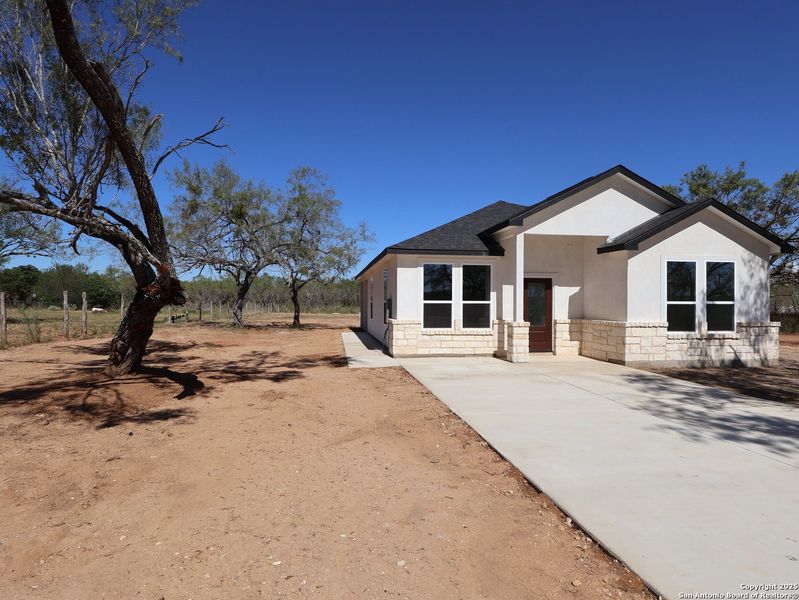 Exterior details and patio area of a home in , Von Ormy (Image 2).