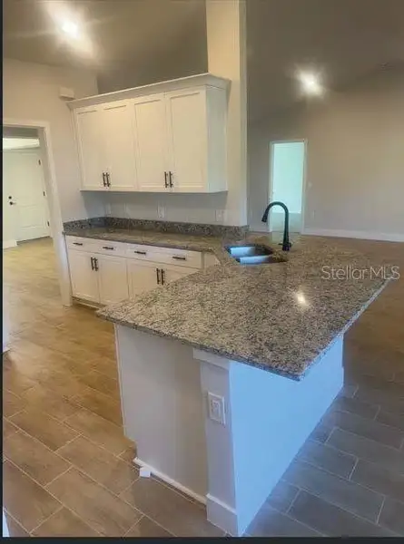 Furnished interior view inside a new home in , Port Charlotte (Image 5).