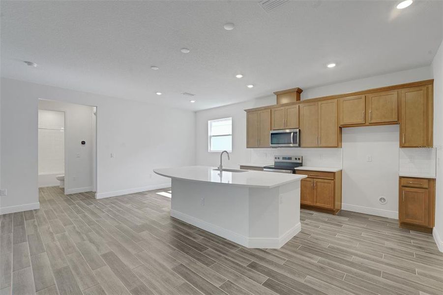 Furnished interior view inside a new home in Angeline, Land O' Lakes (Image 10).