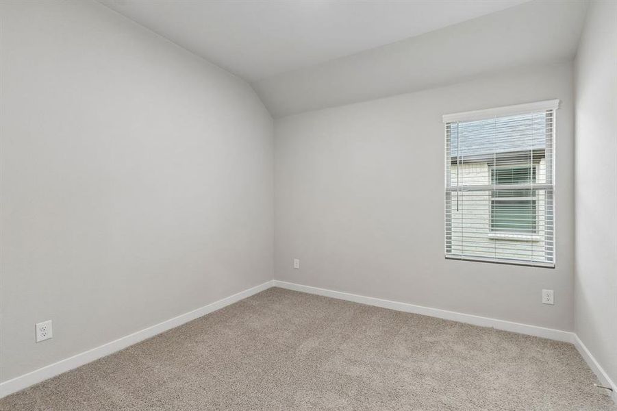Bedroom in the Emmy II home plan by Trophy Signature Homes - REPRESENTATIVE PHOTO