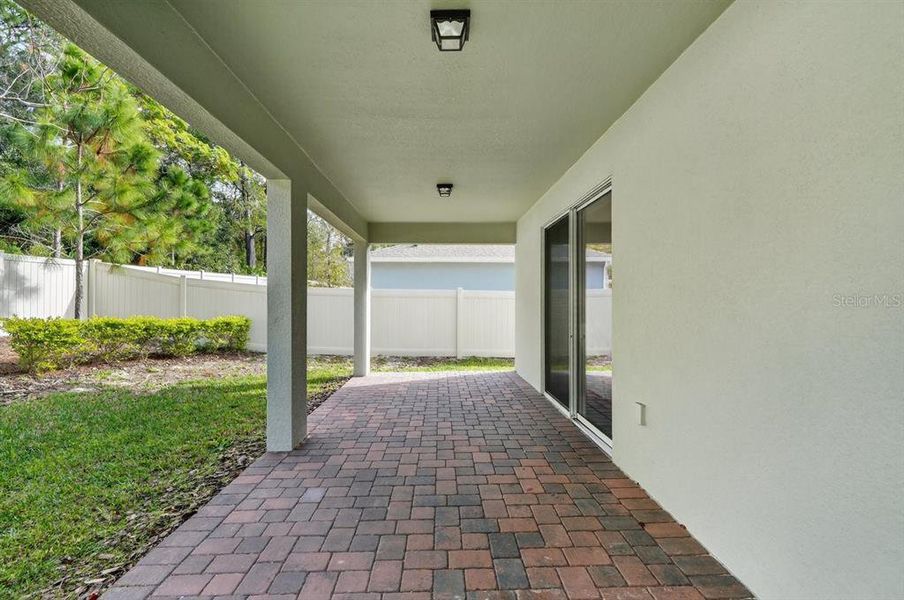 Exterior details and patio area of a home in Canopy Terrace, Deland (Image 3). Exterior details and patio area of a home in Canopy Terrace, Deland (Image 3).