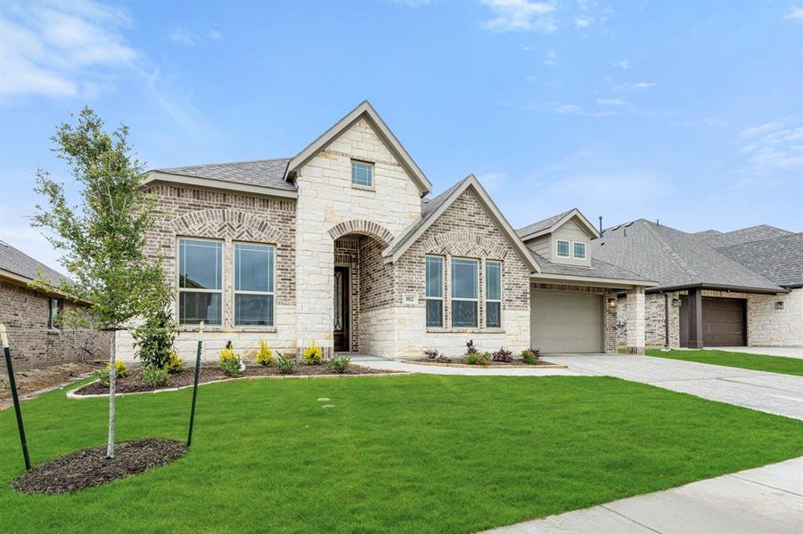 Front exterior of a new home in Sunset Ridge, Alvarado, TX, highlighting curb appeal (Image 23).