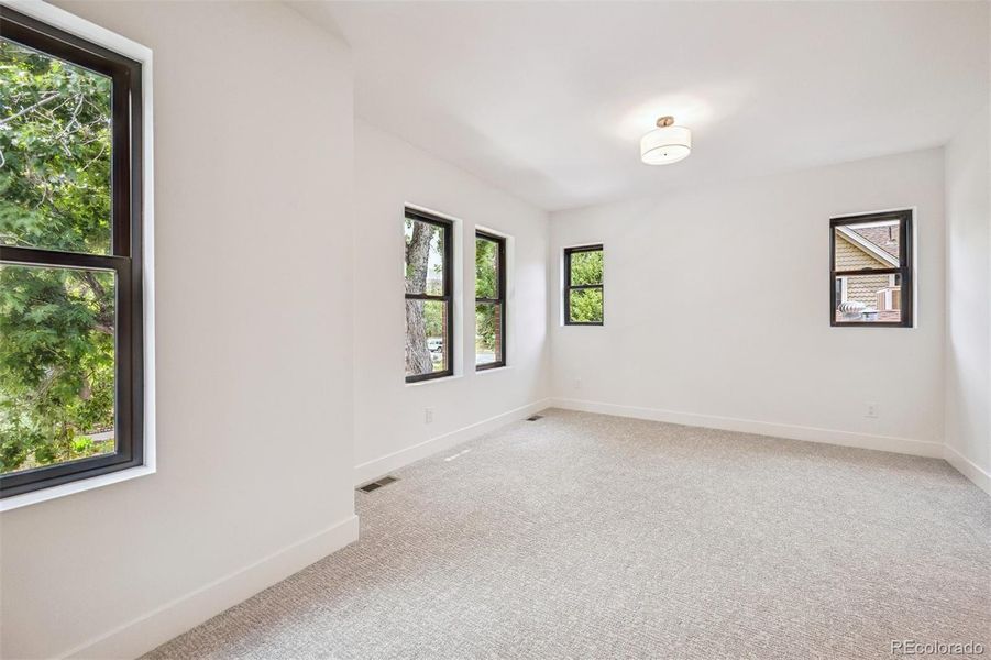 Second floor bedroom with ensuite bath and walk in closet