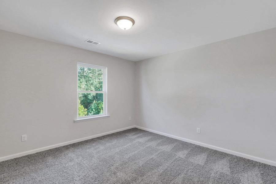 Spacious, unfurnished interior of a new home in Settlers Hammock, Kingsland (Image 19).