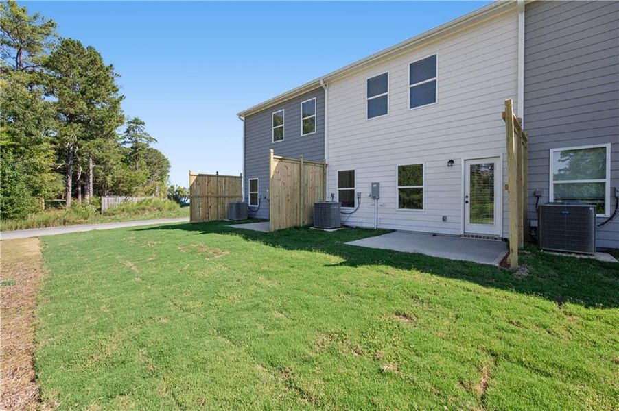 Exterior details and patio area of a home in Village Green, Adairsville (Image 3).